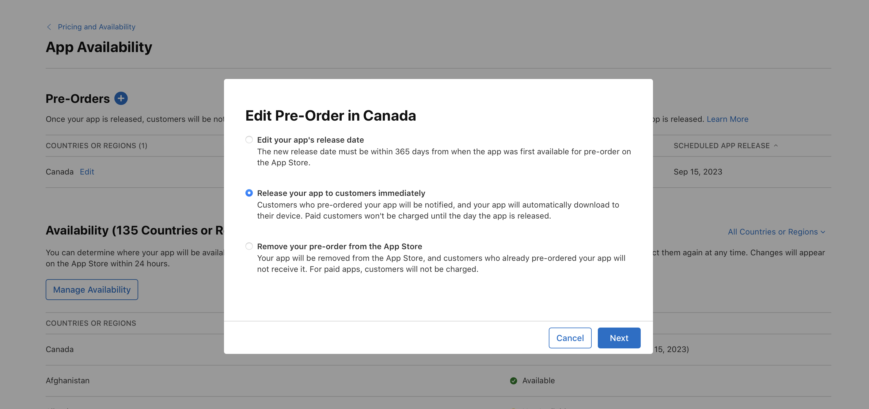 Screenshot of the Edit Pre-Order in Canada dialog, where there are three options: "Edit your app's release date", "Release your app to customers immediately", and "Remove your pre-order from the App Store". The "Release your app to customers immediately" option is selected. At the bottom, Cancel and Next buttons are on the right.